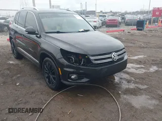2012 Volkswagen Tiguan SE with VIN WVGAV7AX0CW602713, listed as a IAAI auction lot 41558520 with 95,678 mi miles and . Bid and sale history available at DreamBid. Image 1.