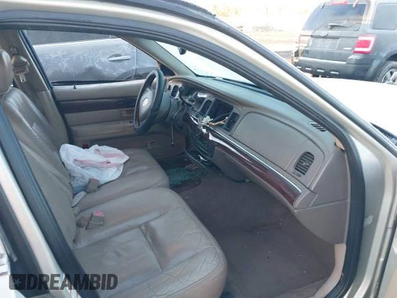 2003 Mercury Grand Marquis LS Premium with VIN 2MEHM75W53X704387, listed as a IAAI auction lot 41838775 with 312,869 mi miles and . Bid and sale history available at DreamBid. Image 5.