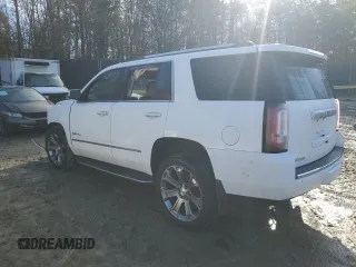 2017 GMC Yukon Denali with VIN 1GKS2CKJ3HR192875, listed as a Copart auction lot 50369075 with 112,877 mi miles and Salvage Title. Bid and sale history available at carsss.com. Image 2.