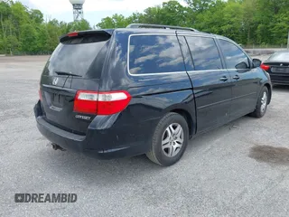 2005 Honda Odyssey EX-L with VIN 5FNRL38775B085512, listed as a IAAI auction lot 42128261 with Not Provided miles and . Bid and sale history available at DreamBid. Image 4.