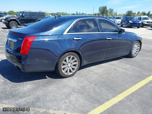 2016 Cadillac CTS Sedan RWD with VIN 1G6AP5SX8G0119984, listed as a IAAI auction lot 41679567 with 98,592 mi miles. Bid and sale history available at carsss.com. Image 4.