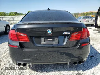 2013 BMW M5 z VIN WBSFV9C55DC772482, wystawiony jako Copart lot #52575345 z przebiegiem 173 513 mil mil oraz Czysty tytuł • Clean title. Historia ofert i sprzedaży dostępna na DreamBid. Obrazek 6.