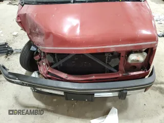 1992 GMC Safari z VIN 1GDEL19W2NB539396, wystawiony jako Copart lot #79221434 z przebiegiem 99 406 mil mil oraz Nie do naprawy. Historia ofert i sprzedaży dostępna na DreamBid. Obrazek 12.