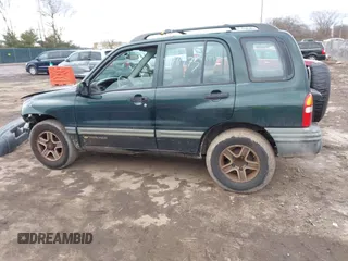 2002 Chevrolet Tracker z VIN 2CNBJ13C126946857, wystawiony jako IAAI lot #41491975 z przebiegiem Nie podano mil oraz . Historia ofert i sprzedaży dostępna na DreamBid. Obrazek 15.