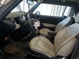 2012 MINI Convertible S with VIN WMWZP3C53CT250070, listed as a Copart auction lot 46649525 with 80,392 mi miles and Salvage Title. Bid and sale history available at DreamBid. Image 7.