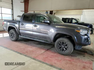 2023 Toyota Tacoma SR z VIN 3TYCZ5AN9PT173473, wystawiony jako Copart lot #54219015 z przebiegiem 22 740 mil mil oraz Szkody całkowita. Historia ofert i sprzedaży dostępna na DreamBid. Obrazek 4.