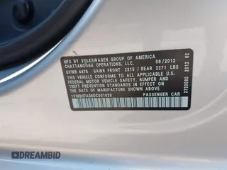 2013 Volkswagen Passat SE with VIN 1VWBH7A36DC001528, listed as a IAAI auction lot 42568026 with 186,814 mi miles and . Bid and sale history available at DreamBid. Image 9.