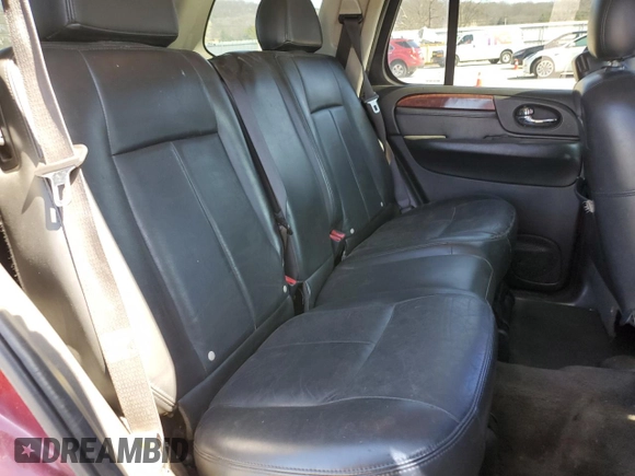 2006 GMC Envoy SLE z VIN 1GKDT13S262210046, wystawiony jako Copart lot #49335595 z przebiegiem 292 940 mil mil oraz Szkoda całkowita • Salvage title. Historia ofert i sprzedaży dostępna na DreamBid. Obrazek 11.