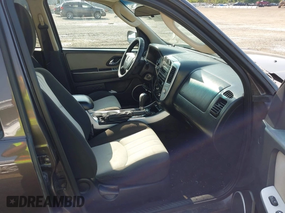2006 Mercury Mariner Luxury with VIN 4M2YU56196KJ20438, listed as a IAAI auction lot 42394996 with 164,564 mi miles and . Bid and sale history available at DreamBid. Image 5.