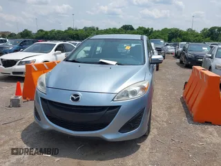 2013 Mazda 5 Sport z VIN JM1CW2BL8D0162446, wystawiony jako IAAI lot #42480874 z przebiegiem 158 223 mil mil oraz . Historia ofert i sprzedaży dostępna na DreamBid. Obrazek 6.