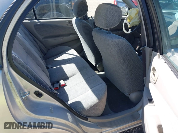2002 Toyota Corolla CE with VIN 1NXBR12E92Z654340, listed as a IAAI auction lot 41805390 with 62,899 mi miles and . Bid and sale history available at DreamBid. Image 8.