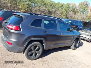 2016 Jeep Cherokee Latitude with VIN 1C4PJLCS1GW222001, listed as a IAAI auction lot 41068661 with 119,399 mi miles. Bid and sale history available at carsss.com. Image 13.