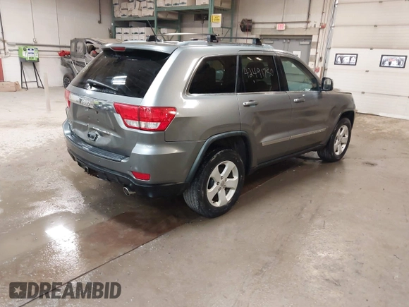 2011 Jeep Grand Cherokee Laredo with VIN 1J4RR4GG7BC578079, listed as a IAAI auction lot 42491750 with 197,581 mi miles and . Bid and sale history available at DreamBid. Image 4.