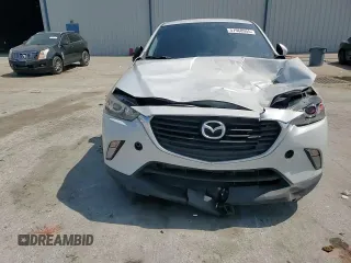2017 Mazda CX-3 Touring z VIN JM1DKDC75H0168823, wystawiony jako Copart lot #57968955 z przebiegiem 116 231 mil mil oraz Szkoda całkowita • Salvage title. Historia ofert i sprzedaży dostępna na DreamBid. Obrazek 14.