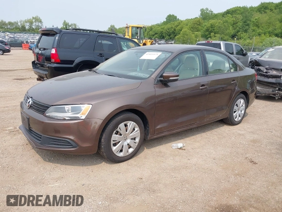 2014 Volkswagen Jetta SE with VIN 3VWD07AJ7EM251973, listed as a IAAI auction lot 42415573 with 124,323 mi miles and . Bid and sale history available at DreamBid. Image 2.