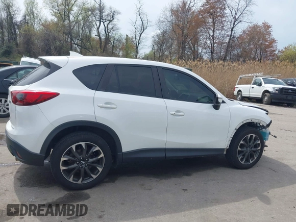 2016 Mazda CX-5 Grand Touring with VIN JM3KE4DY6G0618121, listed as a IAAI auction lot 41958805 with 101,232 mi miles. Bid and sale history available at carsss.com. Image 14.