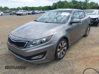 2012 Kia Optima SX with VIN 5XXGR4A6XCG077489, listed as a IAAI auction lot 42158726 with 158,229 mi miles and . Bid and sale history available at carsss.com. Image 2.