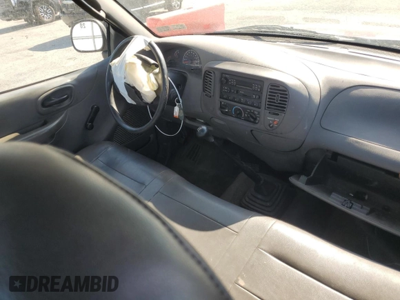 2003 Ford F-150 XL with VIN 1FTRF17293NA33833, listed as a Copart auction lot 54552965 with 70,016 mi miles and Salvage Title. Bid and sale history available at DreamBid. Image 8.