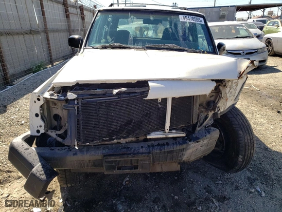 1999 Jeep Cherokee Sport with VIN 1J4FT68S9XL627003, listed as a Copart auction lot 49478595 with 320,444 mi miles and Salvage Title. Bid and sale history available at carsss.com. Image 5.
