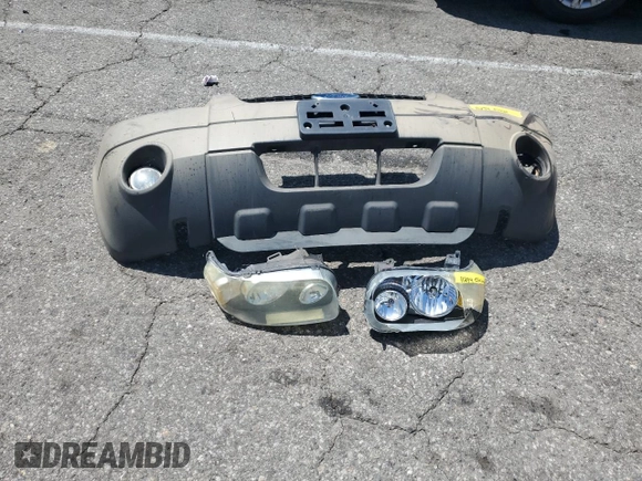 2007 Ford Escape Hybrid with VIN 1FMCU49H87KB61613, listed as a Copart auction lot 58083235 with 129,049 mi miles and Salvage title. Bid and sale history available at DreamBid. Image 13.
