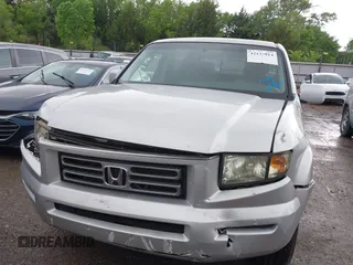 2008 Honda Ridgeline RTS z VIN 2HJYK16458H525443, wystawiony jako IAAI lot #42143814 z przebiegiem 118 057 mil mil oraz . Historia ofert i sprzedaży dostępna na DreamBid. Obrazek 12.