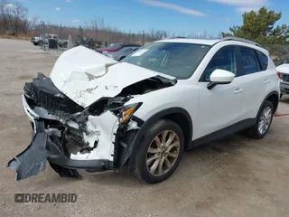2014 Mazda CX-5 Grand Touring with VIN JM3KE4DY8E0397330, listed as a IAAI auction lot 41868116 with 180,891 mi miles. Bid and sale history available at carsss.com. Image 18.