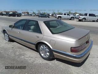 1997 Cadillac Seville Luxury SLS z VIN 1G6KS52Y7VU809288, wystawiony jako IAAI lot #29851802 z przebiegiem 93 879 mil mil oraz . Historia ofert i sprzedaży dostępna na DreamBid. Obrazek 3.