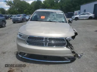 2015 Dodge Durango Citadel with VIN 1C4SDHET0FC873740, listed as a Copart auction lot 56067255 with 131,362 mi miles and Salvage title. Bid and sale history available at DreamBid. Image 5.