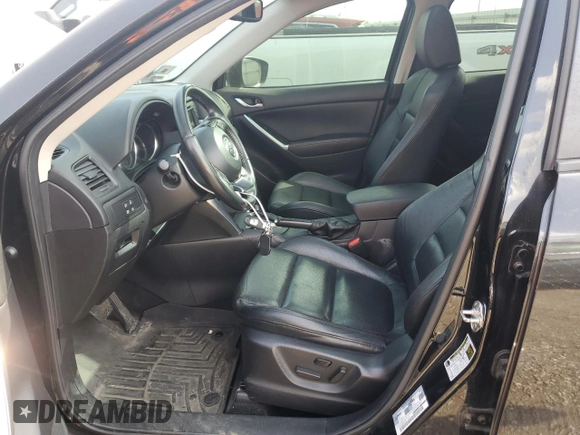 2015 Mazda CX-5 Grand Touring with VIN JM3KE4DY9F0516357, listed as a Copart auction lot 53156215 with 118,621 mi miles and Salvage Title. Bid and sale history available at DreamBid. Image 7.