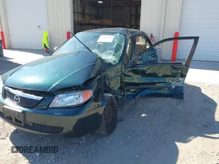 2001 Mazda Protege LX with VIN JM1BJ225310404647, listed as a IAAI auction lot 41480466 with 115,606 mi miles and . Bid and sale history available at carsss.com. Image 6.
