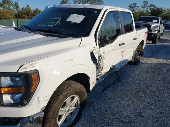 2023 Ford F-150 XL with VIN 1FTEW1EP0PKD78656, listed as a IAAI auction lot 41277719 with 21,825 mi miles. Bid and sale history available at carsss.com. Image 6.