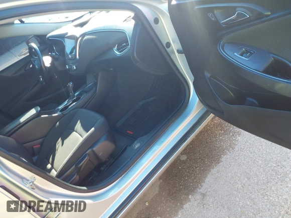 2018 Chevrolet Malibu LT z VIN 1G1ZD5ST4JF244922, wystawiony jako IAAI lot #42218808 z przebiegiem 119 042 mil mil oraz . Historia ofert i sprzedaży dostępna na DreamBid. Obrazek 5.