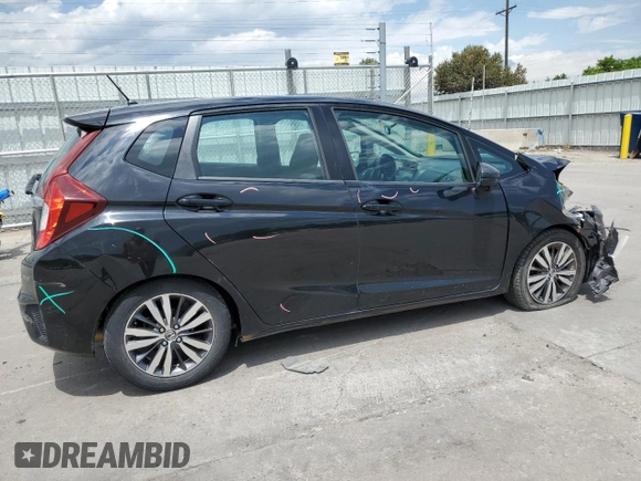 2015 Honda Fit EX-L z VIN 3HGGK5H80FM704920, wystawiony jako Copart lot #59834245 z przebiegiem 86 415 mil mil oraz Szkoda całkowita • Salvage title. Historia ofert i sprzedaży dostępna na DreamBid. Obrazek 3.