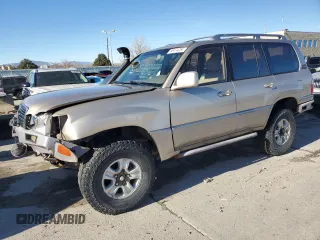 1998 Lexus LX 470 with VIN JT6HT00W5W0012479, listed as a Copart auction lot 80474284 with 304,490 mi miles and Salvage Title. Bid and sale history available at DreamBid. Image 1.