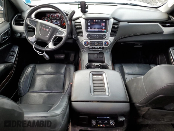 2015 GMC Yukon SLT with VIN 1GKS2BKC9FR518381, listed as a Copart auction lot 66352864 with 103,419 mi miles and Salvage Title. Bid and sale history available at DreamBid. Image 8.