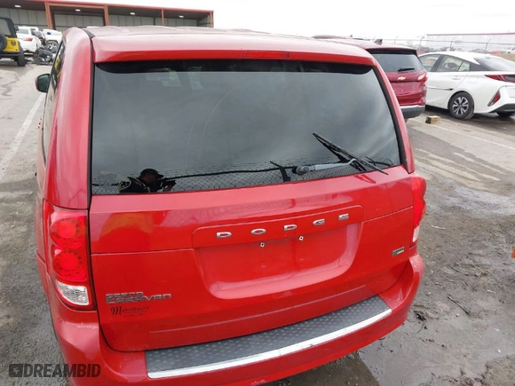2012 Dodge Grand Caravan SXT with VIN 2C4RDGCG3CR408077, listed as a IAAI auction lot 41532827 with 170,716 mi miles. Bid and sale history available at carsss.com. Image 16.