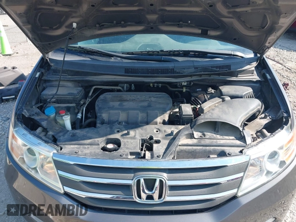 2013 Honda Odyssey Touring with VIN 5FNRL5H98DB080296, listed as a IAAI auction lot 42461843 with 104,901 mi miles and . Bid and sale history available at DreamBid. Image 10.