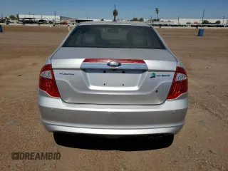 2011 Ford Fusion Hybrid с VIN 3FADP0L36BR251407, выставлен на аукционе Copart как лот 57838085 с пробегом 129 972 миль миль и Чистый • Clean title. История ставок и продаж доступна на DreamBid. Изображение 6.