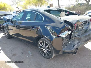 2015 Volvo S60 T5 Drive-E Premier z VIN YV140MFB3F2299721, wystawiony jako IAAI lot #42013732 z przebiegiem 82 407 mil mil oraz . Historia ofert i sprzedaży dostępna na DreamBid. Obrazek 3.