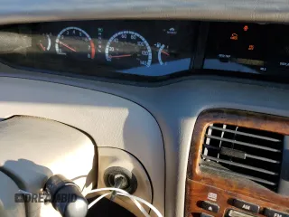 2001 Toyota Avalon XL z VIN 4T1BF28B81U162506, wystawiony jako Copart lot #52031805 z przebiegiem 212 437 mil mil oraz Szkody całkowita. Historia ofert i sprzedaży dostępna na DreamBid. Obrazek 9.