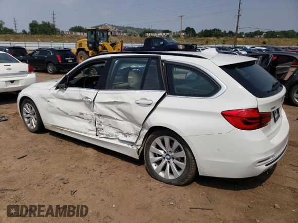 2018 BMW 3 Series 328d xDrive with VIN WBA8J1C53JA018885, listed as a Copart auction lot 64187624 with 84,392 mi miles and Salvage title. Bid and sale history available at DreamBid. Image 2.