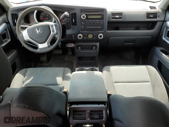 2007 Honda Ridgeline RTX z VIN 2HJYK16357H500239, wystawiony jako Copart lot #70227164 z przebiegiem 186 443 mil mil oraz Czysty tytuł • Clean title. Historia ofert i sprzedaży dostępna na DreamBid. Obrazek 8.