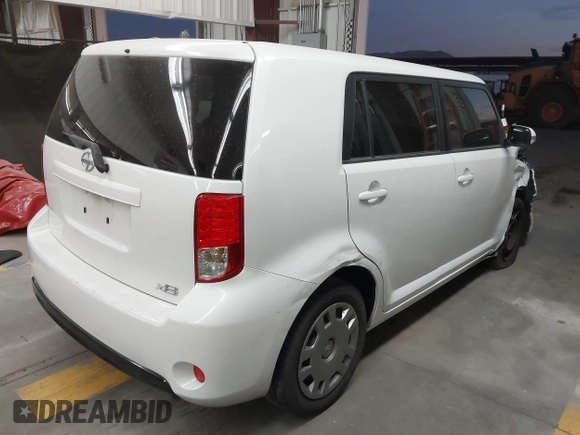 2014 Scion xB with VIN JTLZE4FE1EJ060281, listed as a IAAI auction lot 41477386 with 61,423 mi miles. Bid and sale history available at carsss.com. Image 4.