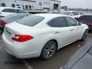 2013 Infiniti M with VIN JN1BY1AP2DM511813, listed as a IAAI auction lot 41577968 with 191,608 mi miles and . Bid and sale history available at DreamBid. Image 4.