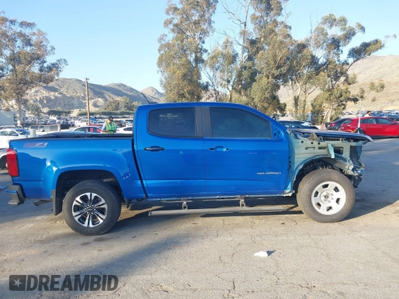 2021 Chevrolet Colorado 4WD Z71 with VIN 1GCGTDEN6M1264115, listed as a IAAI auction lot 41667276 with 31,304 mi miles and . Bid and sale history available at DreamBid. Image 14.