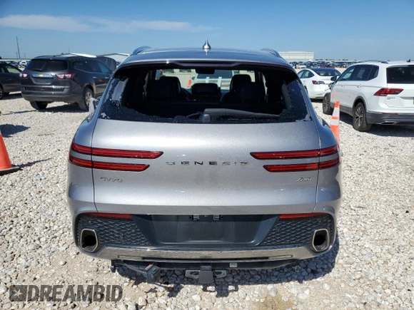 2022 Genesis GV70 2.5T with VIN KMUMADTB4NU070682, listed as a Copart auction lot 56536405 with 73,144 mi miles and Clean title. Bid and sale history available at DreamBid. Image 6.