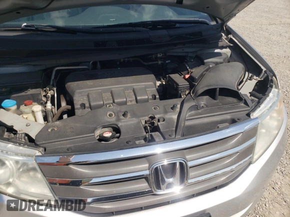 2012 Honda Odyssey Touring with VIN 5FNRL5H94CB009952, listed as a Copart auction lot 54322695 with 135,551 mi miles and Salvage title. Bid and sale history available at DreamBid. Image 12.