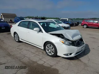 2012 Toyota Avalon z VIN 4T1BK3DB1CU454489, wystawiony jako IAAI lot #42230293 z przebiegiem 197 117 mil mil oraz . Historia ofert i sprzedaży dostępna na DreamBid. Obrazek 1.