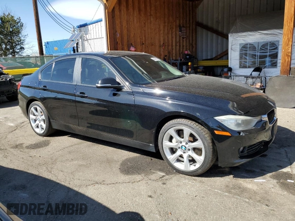 2014 BMW 3 Series 335i xDrive with VIN WBA3B9G53ENR90601, listed as a Copart auction lot 48493275 with 129,992 mi miles and Salvage Title. Bid and sale history available at carsss.com. Image 4.