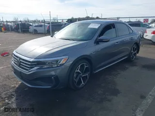 2020 Volkswagen Passat 2.0T R-Line with VIN 1VWMA7A35LC017795, listed as a IAAI auction lot 41228878 with 54,811 mi miles. Bid and sale history available at carsss.com. Image 2.